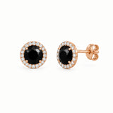 Boucles d’oreilles Alba en or champagne, ornées d'onyx noir, entourés de zircons naturels sertis.