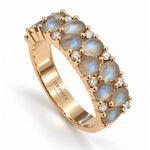 photo de bague dorée en labradorite taillées en poires et zircons logo orphée bijoux 